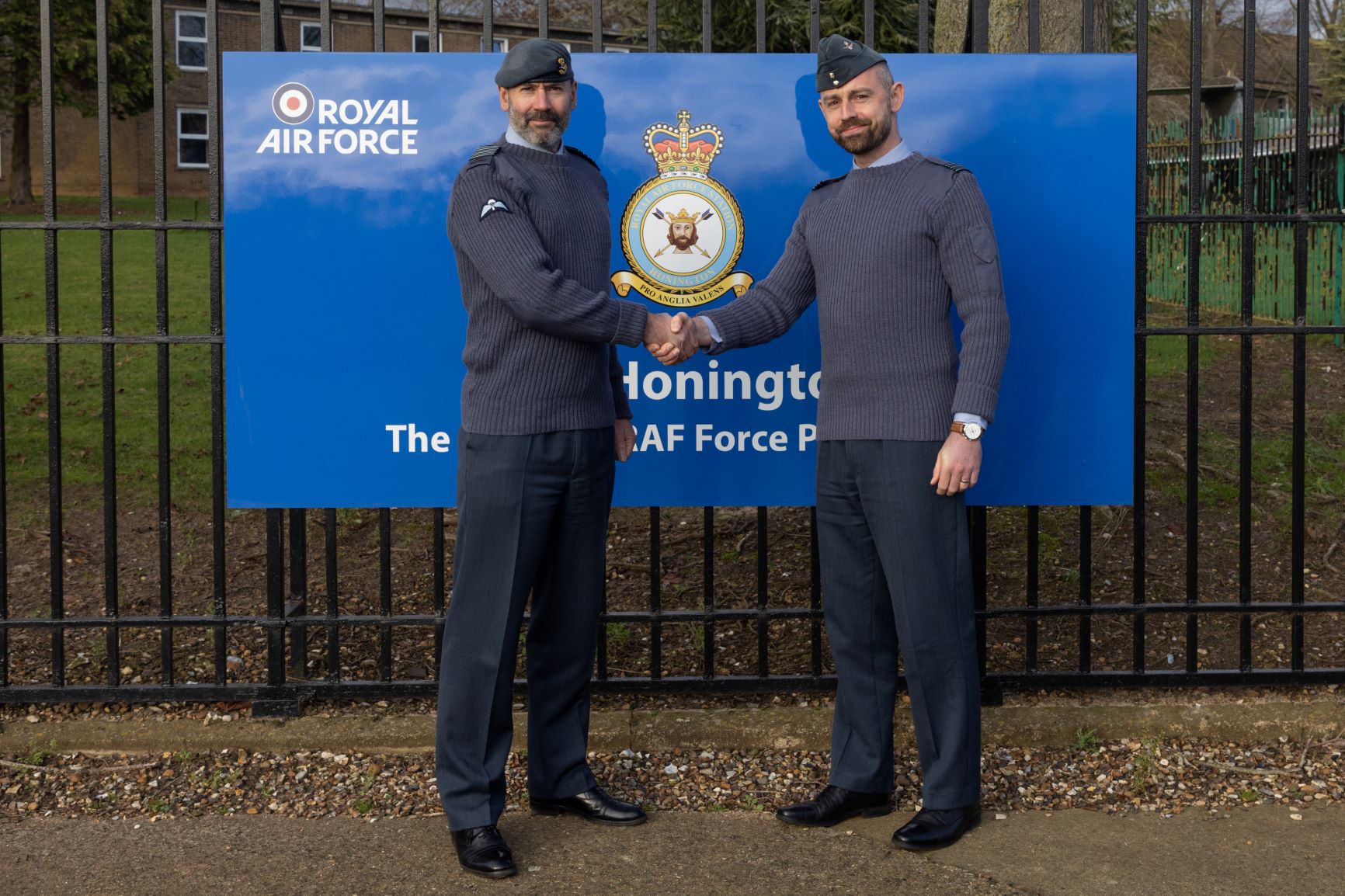 Image show Station Commander shaking hands with a RAF aviator.